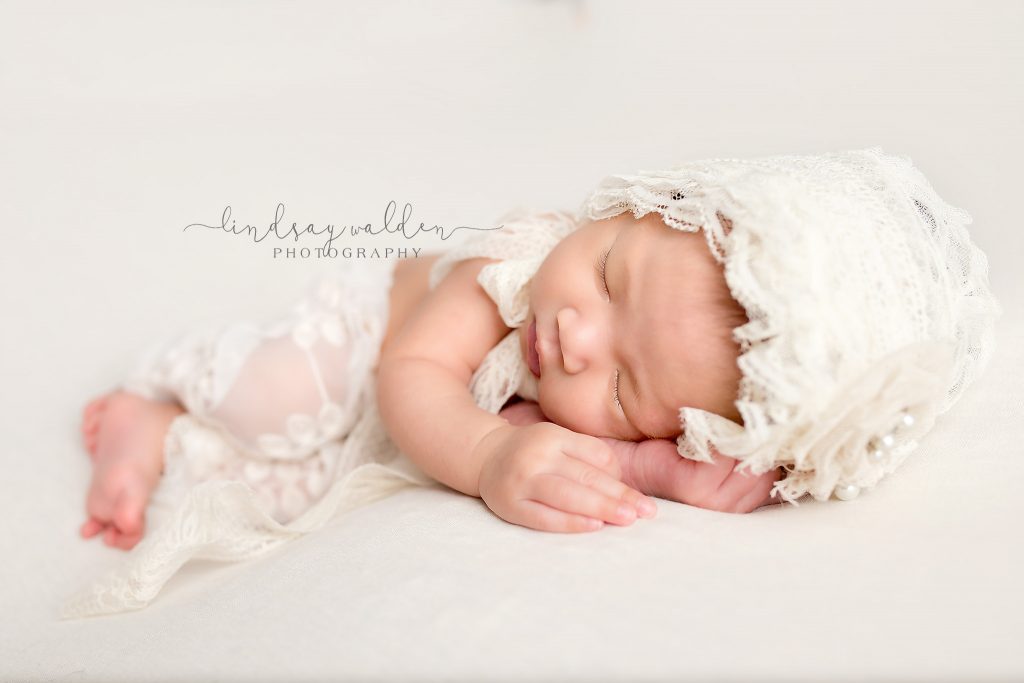 Newborn portait in white