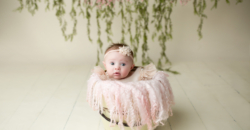 baby girl elegant sweet pink flowers expressive Fort Worth photography