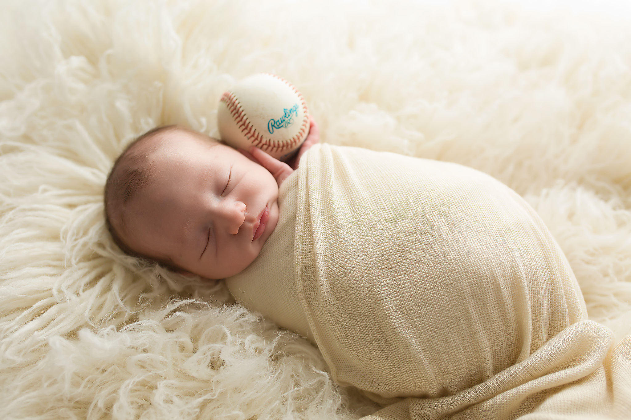 Baby photo with baseball