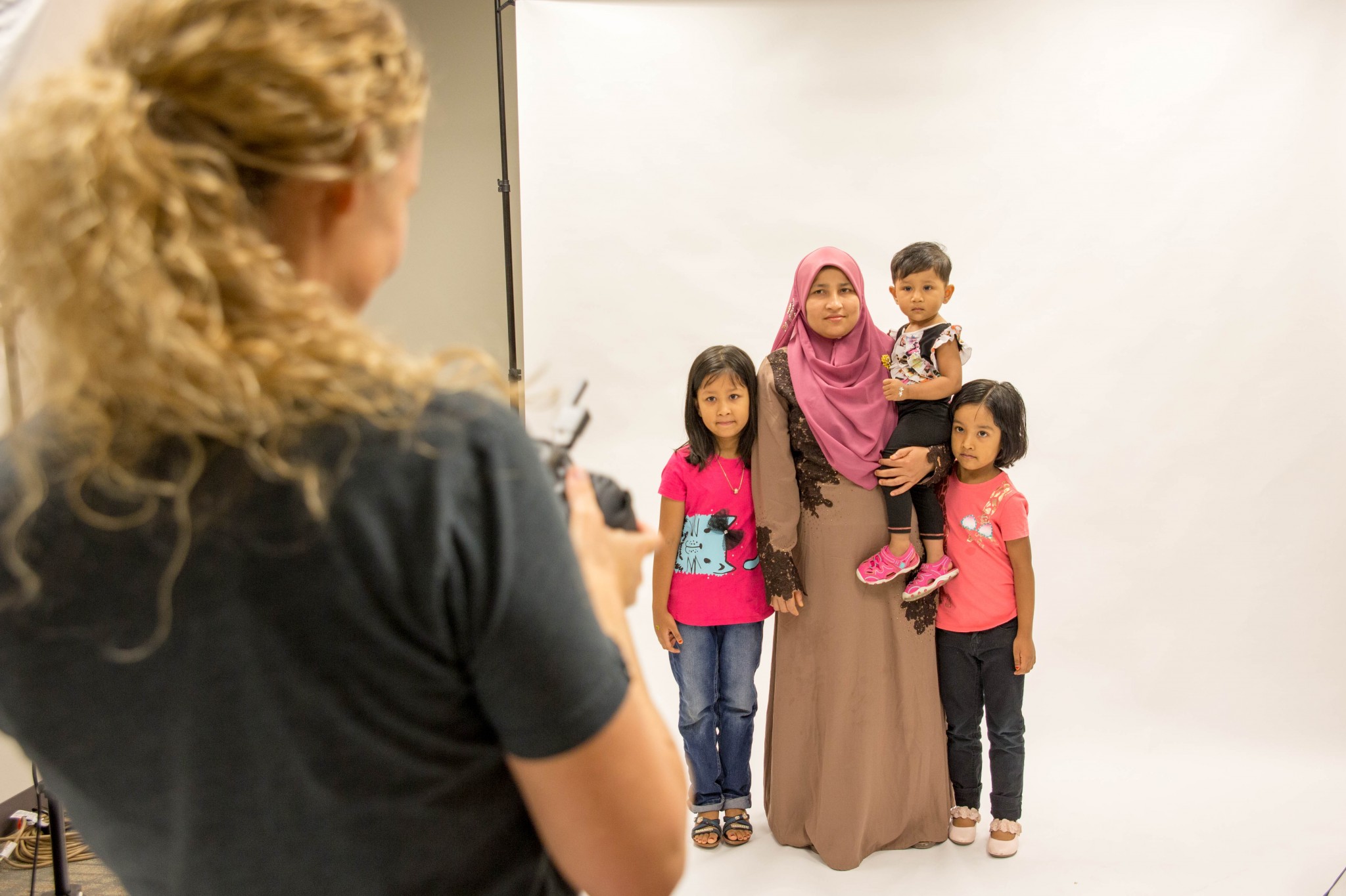world refugee day photography volunteers dallas newborn photographer serving our community
