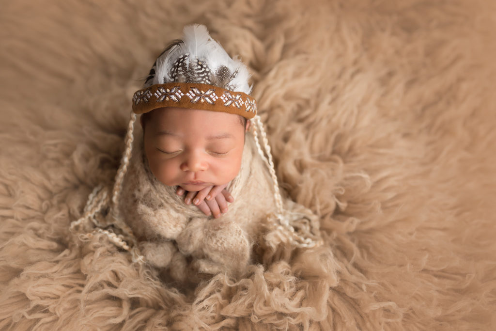 native american themed newborn session with headdress