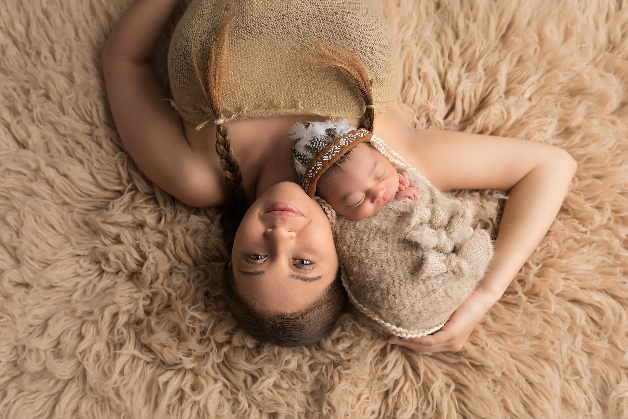 native american themed newborn session parent images