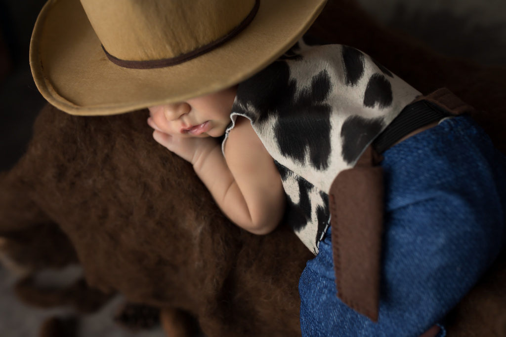 newborn cowboy costume dallas photographer costumed newborns