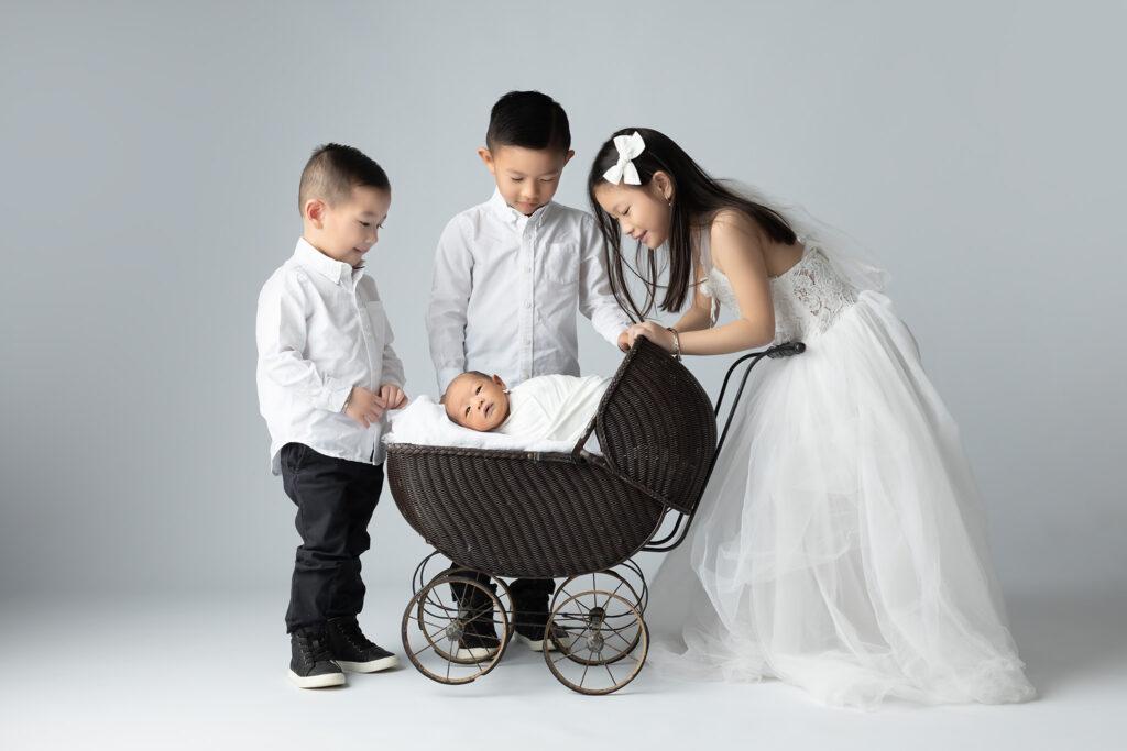 newborn portrait with siblings